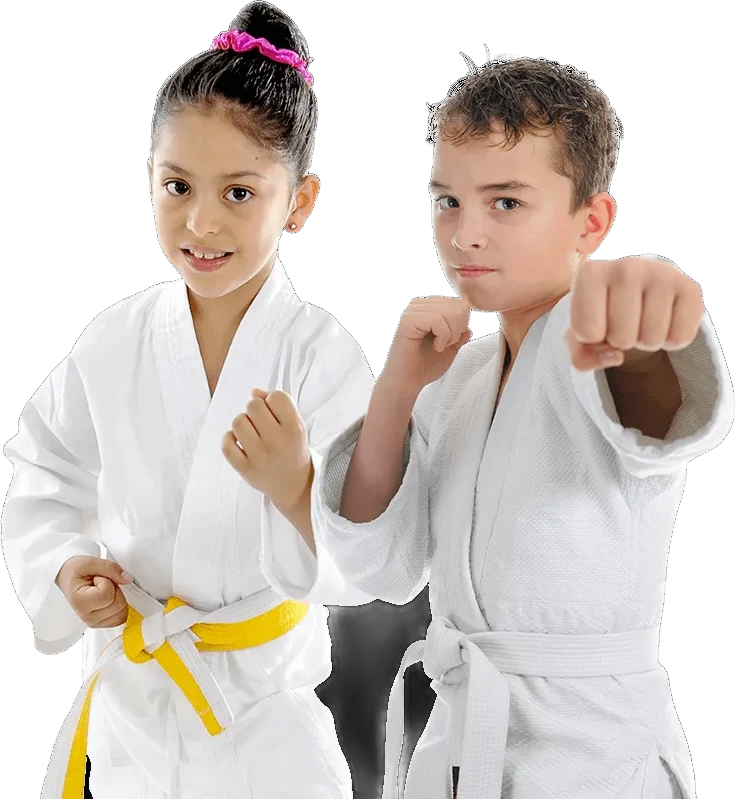 A girl and a boy in white Taekwondo uniforms in fighting stance