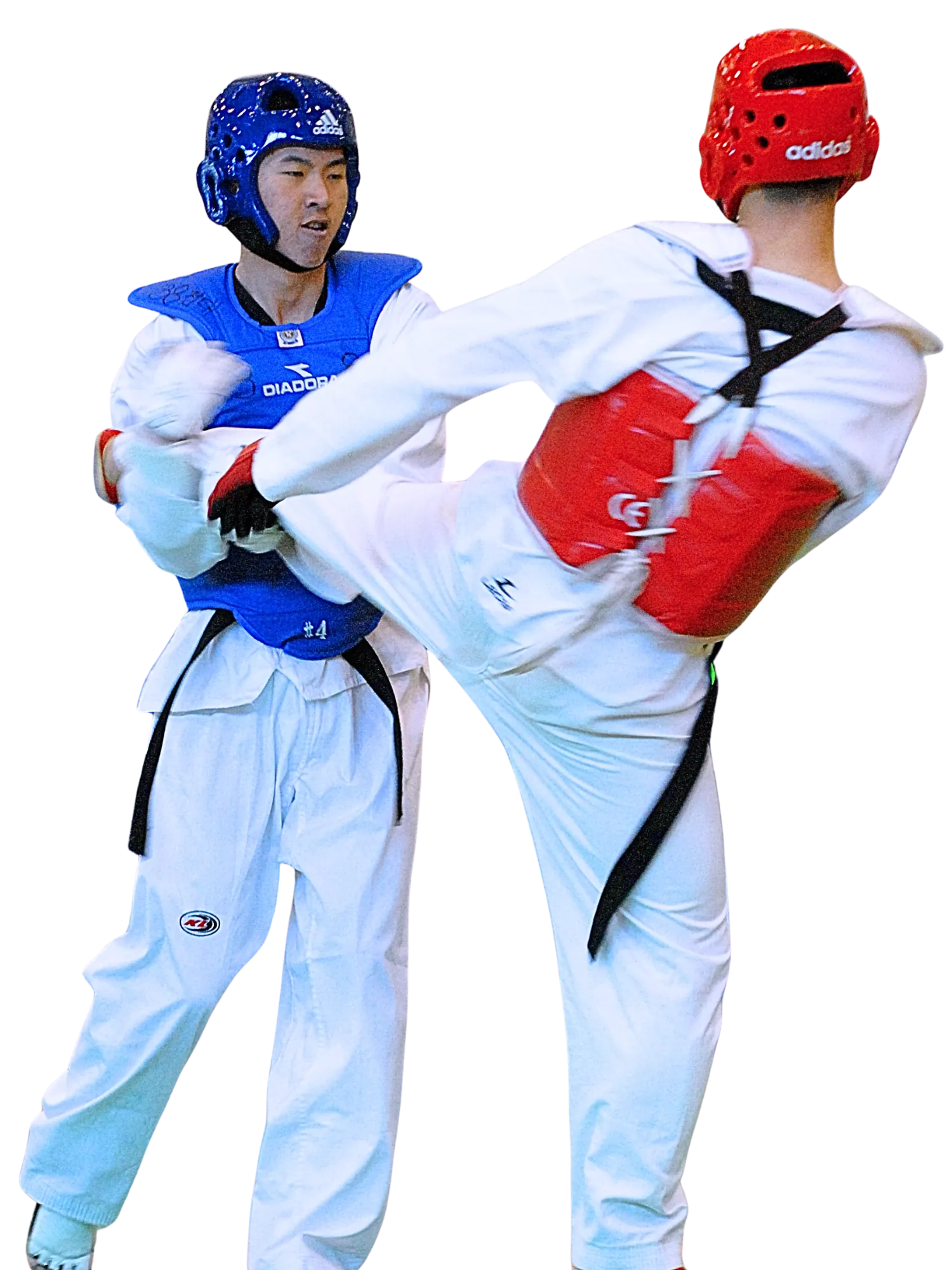 Two teen athletes sparring in full Taekwondo gear