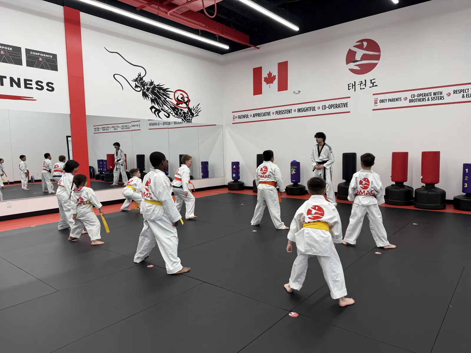 Students stretching on the mats