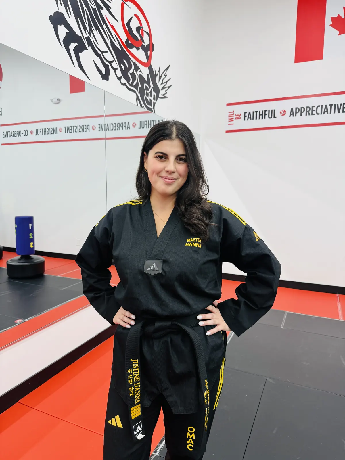 An OMAC instructor in black uniform
